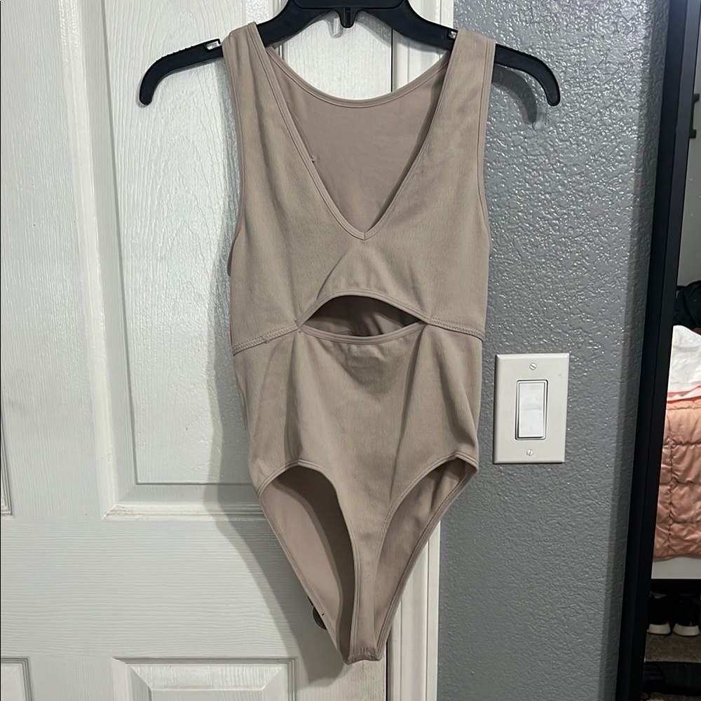 Stylish BRAND NEW Tan bodysuit One Piece